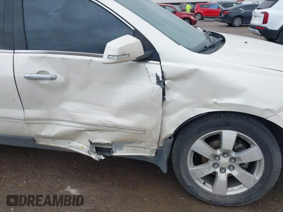2014 Chevrolet Traverse LTZ with VIN 1GNKRJKD9EJ168099, listed as a IAAI auction lot 41955937 with 171,371 mi miles and . Bid and sale history available at DreamBid. Image 6.