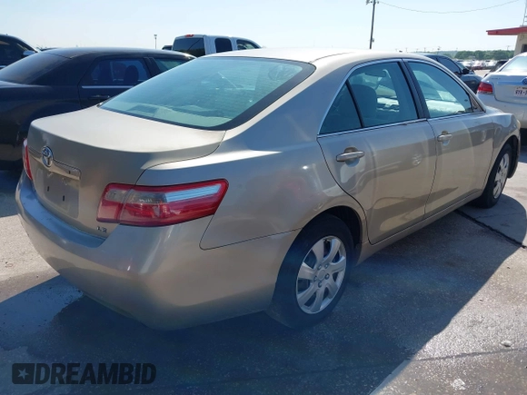2009 Toyota Camry with VIN 4T1BE46K09U854188, listed as a IAAI auction lot 41973199 with 210,924 mi miles. Bid and sale history available at carsss.com. Image 4.