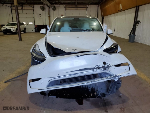 2022 Tesla Model Y Long Range with VIN 7SAYGDEE8NF331916, listed as a Copart auction lot 71288894 with 0 mi miles and Salvage Title. Bid and sale history available at carsss.com. Image 5.