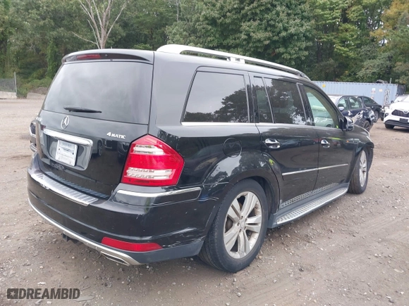 2011 Mercedes-Benz GL-Class GL 450 with VIN 4JGBF7BE6BA635581, listed as a IAAI auction lot 40401205 with 112,344 mi miles. Bid and sale history available at carsss.com. Image 4.