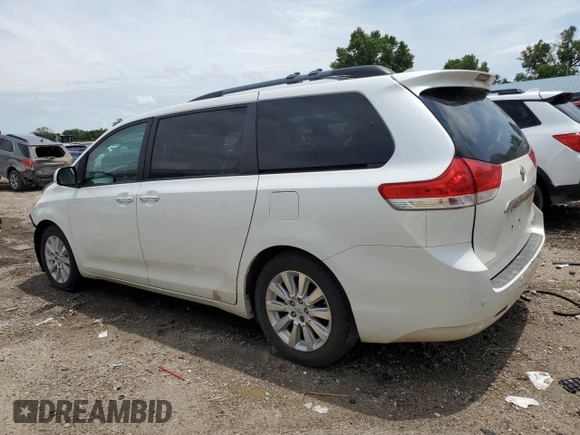 2011 Toyota Sienna XLE AAS with VIN 5TDYK3DC4BS045123, listed as a Copart auction lot 61001785 with 149,260 mi miles and Salvage title. Bid and sale history available at DreamBid. Image 2.