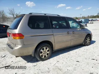 2004 Honda Odyssey EX-L with VIN 5FNRL18974B085790, listed as a Copart auction lot 49159665 with 179,207 mi miles and Salvage Title. Bid and sale history available at DreamBid. Image 3.