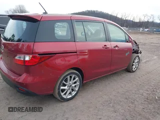 2014 Mazda 5 Touring with VIN JM1CW2CL3E0163360, listed as a IAAI auction lot 41492478 with 133,321 mi miles. Bid and sale history available at carsss.com. Image 4.