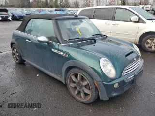 2007 MINI Convertible S with VIN WMWRH33517TL95143, listed as a Copart auction lot 88068045 with 115,827 mi miles and Salvage title. Bid and sale history available at DreamBid. Image 4.