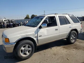 1996 Isuzu Rodeo z VIN 4S2CK58V3T4304736, wystawiony jako Copart lot #76058144 z przebiegiem 125 543 mil mil oraz Szkody całkowita. Historia ofert i sprzedaży dostępna na DreamBid. Obrazek 1.