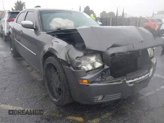 2010 Chrysler 300 Touring with VIN 2C3CA5CV2AH125842, listed as a IAAI auction lot 41804591 with 241,216 mi miles. Bid and sale history available at carsss.com. Image 1.