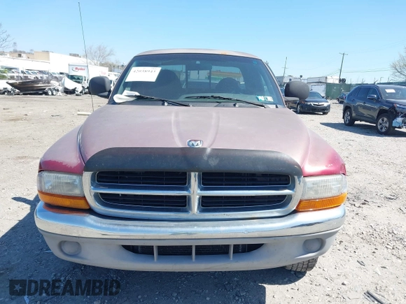 1999 Dodge Dakota SLT z VIN 1B7GL22X2XS222162, wystawiony jako IAAI lot #42038943 z przebiegiem 222 883 mil mil oraz . Historia ofert i sprzedaży dostępna na DreamBid. Obrazek 11.