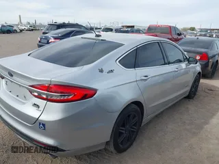 2018 Ford Fusion Energi SE with VIN 3FA6P0PU4JR123581, listed as a IAAI auction lot 41134246 with 226,813 mi miles. Bid and sale history available at carsss.com. Image 4.