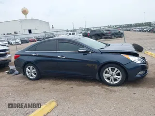 2012 Hyundai Sonata SE z VIN 5NPEC4AC7CH341786, wystawiony jako IAAI lot #41890326 z przebiegiem 114 678 mil mil oraz . Historia ofert i sprzedaży dostępna na DreamBid. Obrazek 14.