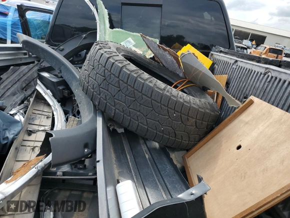 2016 Nissan Titan SL z VIN 1N6BA1F22GN504550, wystawiony jako Copart lot #56616955 z przebiegiem 176 020 mil mil oraz Szkoda całkowita • Salvage title. Historia ofert i sprzedaży dostępna na DreamBid. Obrazek 12.