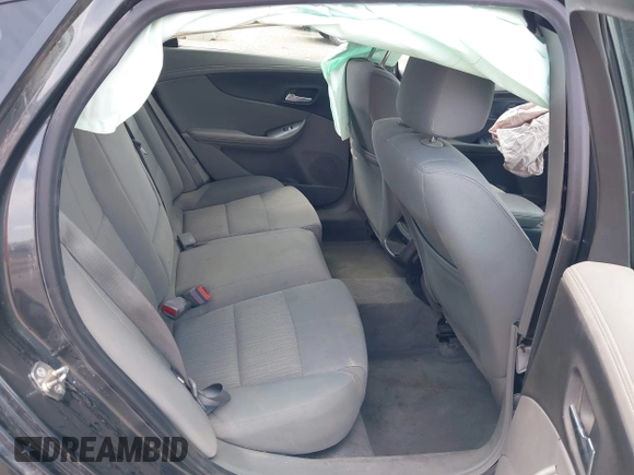 2014 Chevrolet Impala LS with VIN 1G11X5SL0EU164667, listed as a IAAI auction lot 42542110 with 150,458 mi miles and . Bid and sale history available at DreamBid. Image 8.