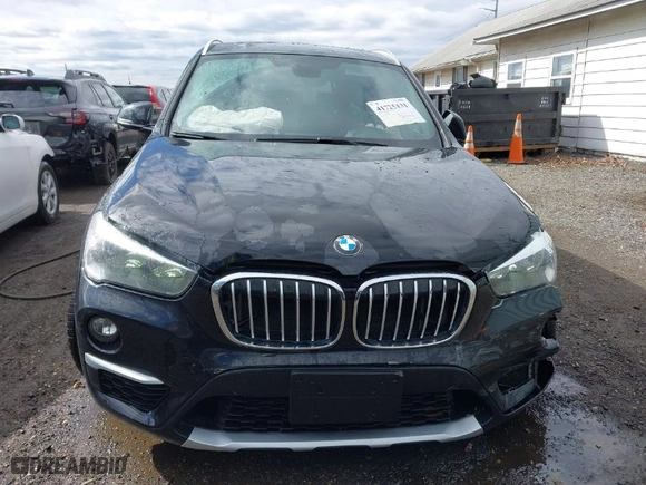 2018 BMW X1 xDrive28i with VIN WBXHT3C35J5L34646, listed as a IAAI auction lot 41725131 with 81,983 mi miles. Bid and sale history available at carsss.com. Image 12.