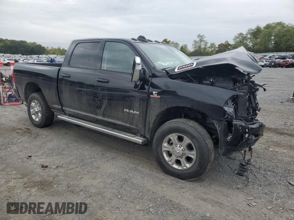 2023 Ram 2500 Laramie with VIN 3C6UR5FL4PG580565, listed as a Copart auction lot 71935344 with 13,939 mi miles and Salvage Title. Bid and sale history available at carsss.com. Image 4.