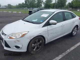 2013 Ford Focus SE with VIN 1FADP3F29DL306051, listed as a IAAI auction lot 42457611 with 86,817 mi miles and . Bid and sale history available at DreamBid. Image 12.