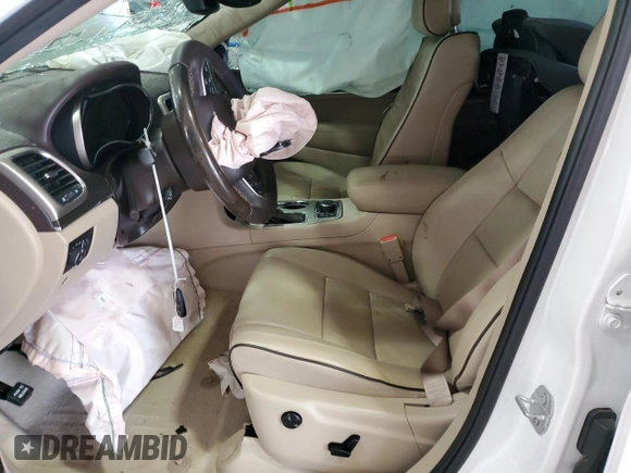 2017 Jeep Grand Cherokee Overland with VIN 1C4RJFCG1HC842890, listed as a Copart auction lot 63395045 with Not provided miles and Salvage title. Bid and sale history available at DreamBid. Image 7.