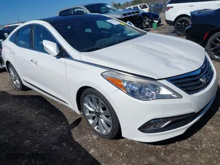 2016 Hyundai Azera Limited with VIN KMHFH4JG0GA508622, listed as a IAAI auction lot 41598287 with 69,013 mi miles. Bid and sale history available at carsss.com. Image 1.