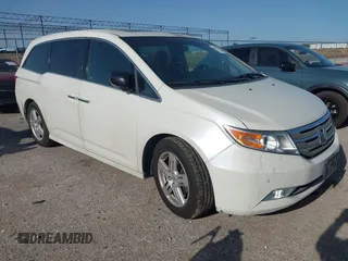 2012 Honda Odyssey Touring с VIN 5FNRL5H93CB125241, выставлен на аукционе IAAI как лот 42299053 с пробегом 125 549 миль миль и . История ставок и продаж доступна на DreamBid. Изображение 1.