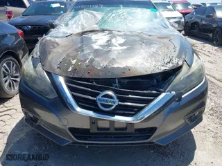 2016 Nissan Altima 2.5 S with VIN 1N4AL3AP2GC170299, listed as a IAAI auction lot 41801159 with 113,694 mi miles. Bid and sale history available at carsss.com. Image 15.