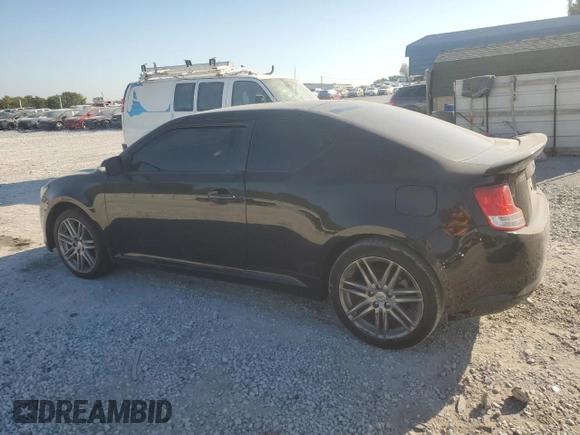 2012 Scion tC z VIN JTKJF5C73C3034583, wystawiony jako Copart lot #74317714 z przebiegiem 163 158 mil mil oraz Czysty tytuł • Clean title. Historia ofert i sprzedaży dostępna na DreamBid. Obrazek 2.
