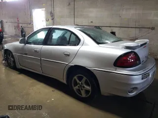 2001 Pontiac Grand Am GT with VIN 1G2NW52E11C194696, listed as a Copart auction lot 47326205 with 248,019 mi miles and Salvage Title. Bid and sale history available at carsss.com. Image 2.