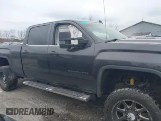 2015 GMC Sierra 2500HD available WiFi Denali with VIN 1GT120E84FF681816, listed as a IAAI auction lot 40967677 with 187,561 mi miles. Bid and sale history available at carsss.com. Image 13.