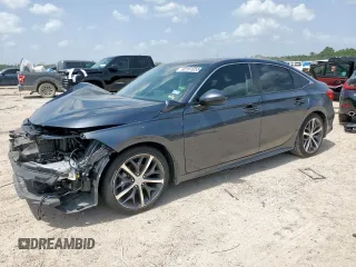 2023 Honda Civic Touring with VIN 2HGFE1F93PH323604, listed as a Copart auction lot 60161055 with 29,629 mi miles and Salvage title. Bid and sale history available at DreamBid. Image 1.
