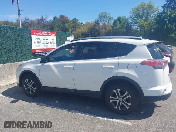 2017 Toyota RAV4 LE with VIN JTMBFREV4HJ112595, listed as a IAAI auction lot 42234289 with 207,379 mi miles and . Bid and sale history available at carsss.com. Image 14.
