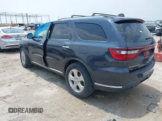 2014 Dodge Durango SXT with VIN 1C4RDHAG3EC560851, listed as a IAAI auction lot 42282572 with Not provided miles and . Bid and sale history available at DreamBid. Image 3.