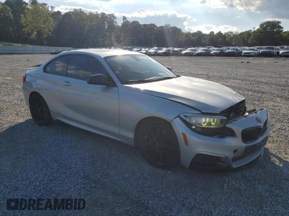 2015 BMW 2 Series M235i with VIN WBA1J7C57FV254038, listed as a Copart auction lot 73657294 with 117,883 mi miles and Salvage Title. Bid and sale history available at carsss.com. Image 4.