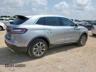 2021 Lincoln Nautilus Standard with VIN 2LMPJ6J97MBL10890, listed as a Copart auction lot 57860015 with 7,052 mi miles and Salvage title. Bid and sale history available at DreamBid. Image 3.