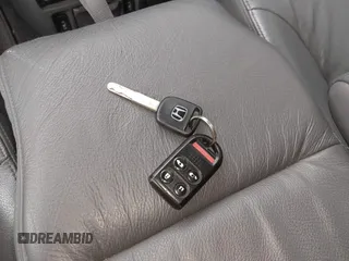 2005 Honda Odyssey EX-L z VIN 5FNRL38755B126414, wystawiony jako IAAI lot #42327946 z przebiegiem 340 043 mil mil oraz . Historia ofert i sprzedaży dostępna na DreamBid. Obrazek 11.