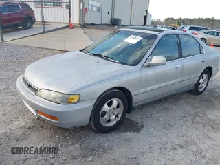 1997 Honda Accord Special Edition with VIN 1HGCD560XVA267719, listed as a IAAI auction lot 41680625 with 325,852 mi miles and . Bid and sale history available at carsss.com. Image 2.