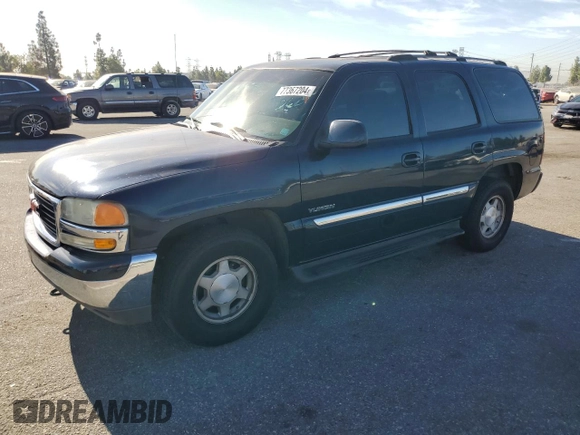 2004 GMC Yukon SLE with VIN 1GKEC13V84R179274, listed as a Copart auction lot 77367204 with 309,239 mi miles and Salvage Title. Bid and sale history available at carsss.com. Image 1.