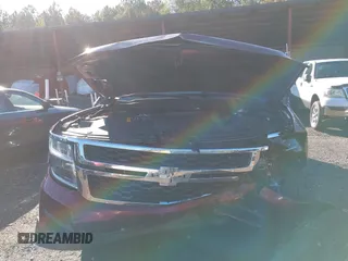 2017 Chevrolet Suburban LT with VIN 1GNSKHKC3HR311901, listed as a IAAI auction lot 40883429 with 141,325 mi miles. Bid and sale history available at carsss.com. Image 6.