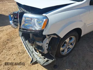 2014 Honda Pilot EX-L with VIN 5FNYF3H53EB025048, listed as a IAAI auction lot 42060266 with Not Provided miles and . Bid and sale history available at carsss.com. Image 6.