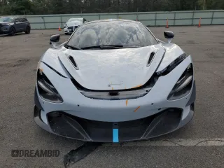 2019 McLaren 720S z VIN SBM14DCAXKW003449, wystawiony jako Copart lot #67229694 z przebiegiem 56 091 mil mil oraz Szkody całkowita. Historia ofert i sprzedaży dostępna na DreamBid. Obrazek 5.