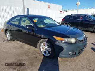 2010 Acura TSX with VIN JH4CU2F61AC041244, listed as a IAAI auction lot 41232564 with 82,604 mi miles. Bid and sale history available at carsss.com. Image 1.