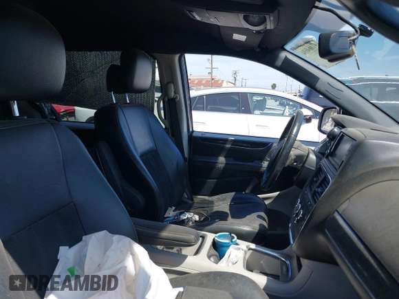 2018 Dodge Grand Caravan SXT with VIN 2C4RDGCG7JR203374, listed as a IAAI auction lot 41664694 with 113,332 mi miles and . Bid and sale history available at DreamBid. Image 5.