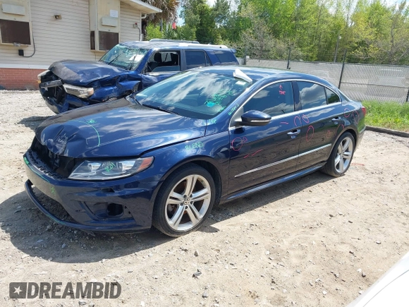 2014 Volkswagen CC R-Line with VIN WVWBP7AN7EE507463, listed as a IAAI auction lot 41984136 with 100,531 mi miles. Bid and sale history available at carsss.com. Image 2.