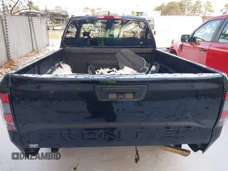 2022 Nissan Frontier S with VIN 1N6ED1CMXNN647043, listed as a IAAI auction lot 41410487 with 20,463 mi miles and . Bid and sale history available at DreamBid. Image 16.