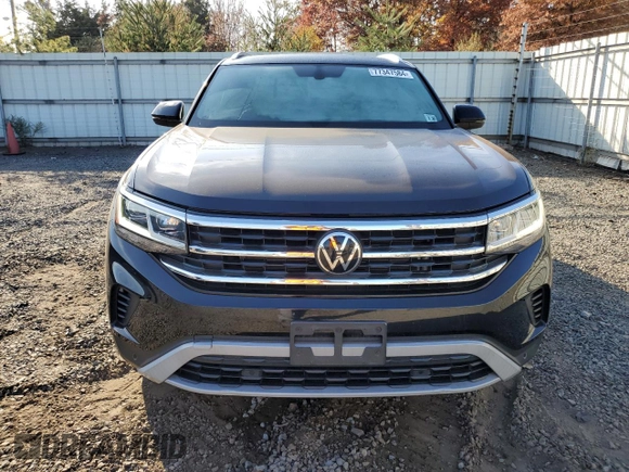 2023 Volkswagen Atlas SE with VIN 1V2KE2CA2PC206051, listed as a Copart auction lot 77347584 with 19,297 mi miles and Salvage title. Bid and sale history available at DreamBid. Image 5.
