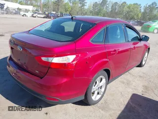 2014 Ford Focus SE with VIN 1FADP3F27EL202224, listed as a IAAI auction lot 42067644 with 174,674 mi miles. Bid and sale history available at carsss.com. Image 4.