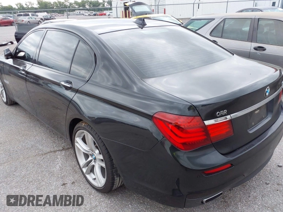 2014 BMW 7 Series 740Li with VIN WBAYE4C51ED138744, listed as a IAAI auction lot 42254213 with 116,157 mi miles and . Bid and sale history available at DreamBid. Image 3.