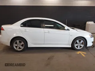 2014 Mitsubishi Lancer SE with VIN JA32V2FW1EU018927, listed as a IAAI auction lot 42059116 with 148,874 mi miles and . Bid and sale history available at carsss.com. Image 13.