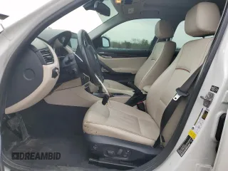 2014 BMW X1 sDrive28i with VIN WBAVM1C51EVW48557, listed as a Copart auction lot 50236455 with 77,166 mi miles and Salvage Title. Bid and sale history available at carsss.com. Image 7.