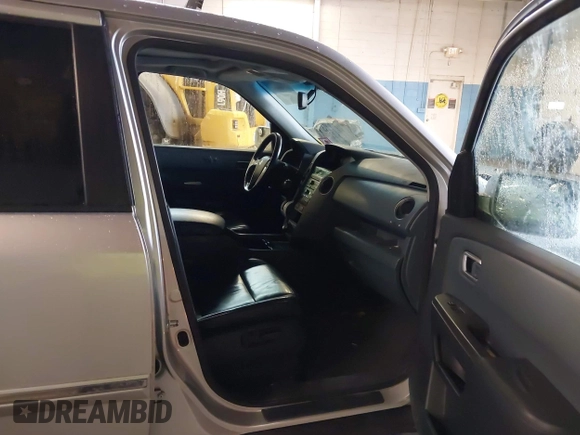 2009 Honda Pilot Touring with VIN 5FNYF48929B010331, listed as a IAAI auction lot 41965094 with 142,490 mi miles and . Bid and sale history available at carsss.com. Image 5.