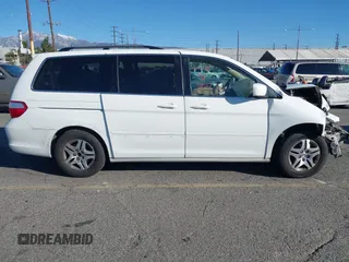 2006 Honda Odyssey EX z VIN 5FNRL38486B410286, wystawiony jako IAAI lot #41641433 z przebiegiem 145 312 mil mil oraz . Historia ofert i sprzedaży dostępna na DreamBid. Obrazek 13.