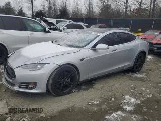2013 Tesla Model S with VIN 5YJSA1AC9DFP10705, listed as a Copart auction lot 89394665 with Not Provided miles and Salvage Title. Bid and sale history available at carsss.com. Image 1.