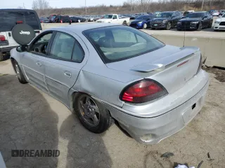 2003 Pontiac Grand Am GT with VIN 1G2NW52E13M707541, listed as a Copart auction lot 41906455 with 218,878 mi miles and Salvage Title. Bid and sale history available at carsss.com. Image 2.