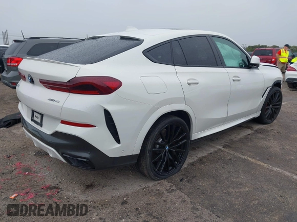 2021 BMW X6 xDrive40i z VIN 5UXCY6C00M9F88215, wystawiony jako IAAI lot #41646498 z przebiegiem 43 587 mil mil oraz . Historia ofert i sprzedaży dostępna na DreamBid. Obrazek 4.
